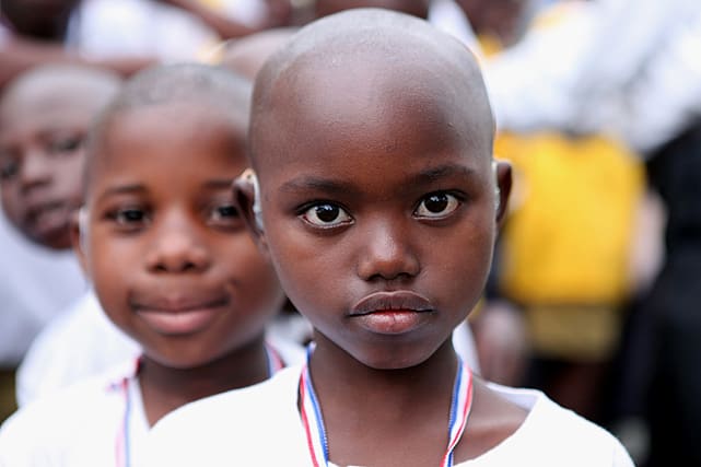 rwanda-2011-boy-with-hearing-aid.jpg